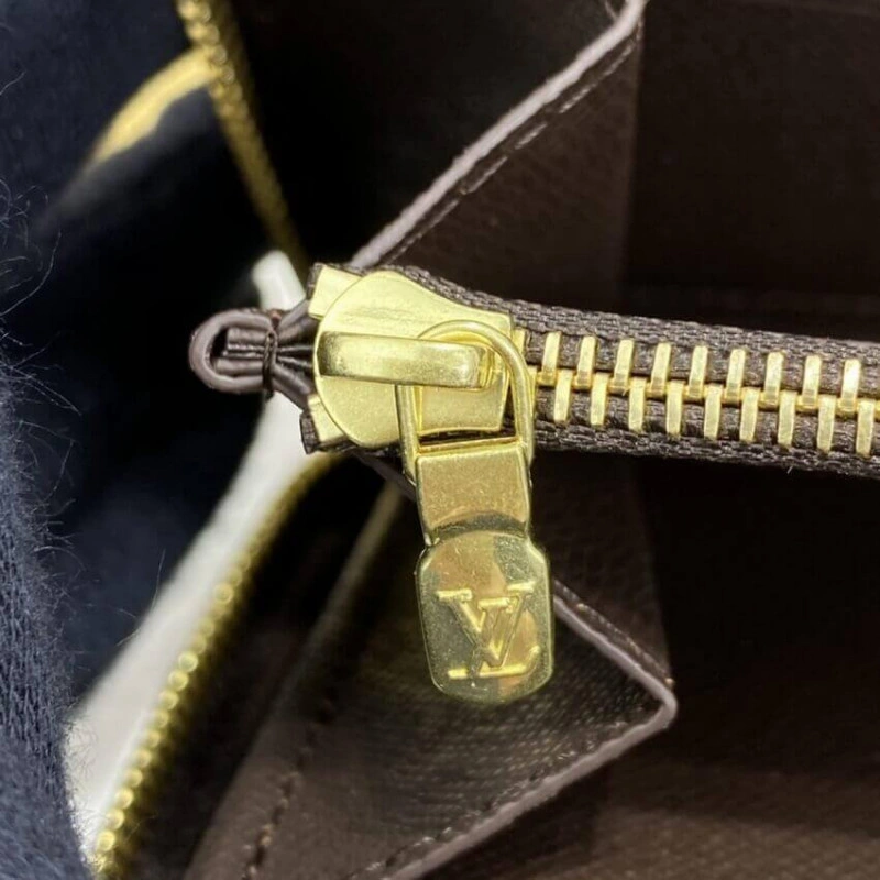 This iconi Louis Vuitton Damier Ebene Zippy Wallet Brown - Image 7