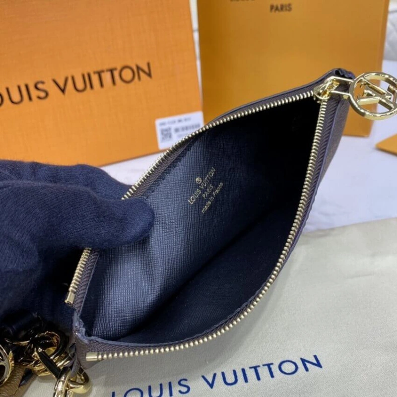 Cowhidele Louis Vuitton Trio Pouch - Image 13