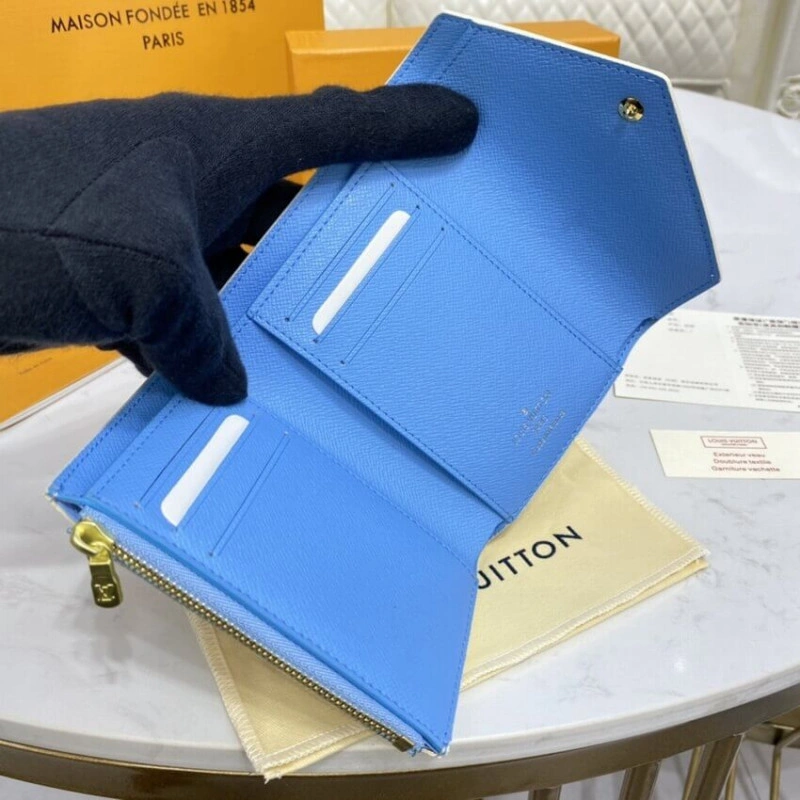 Cowhide l Louis Vuitton Victorine Wallet - Image 10